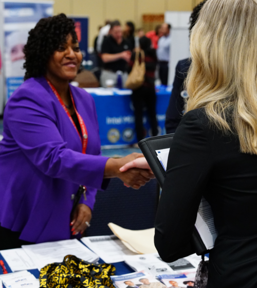 women shaking hands
