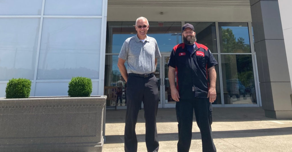 Air Force veteran Michael Coar stands in front of Advantage Toyota in Barbourville, West Virginia.