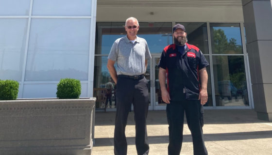 Air Force veteran Michael Coar stands in front of Advantage Toyota in Barbourville, West Virginia.