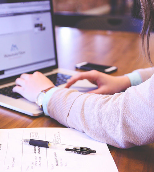 woman remote working on her laptop