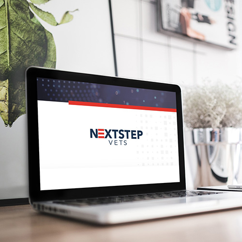 Next Step Vets logo on a laptop