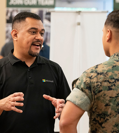 Transitioning service member speaks with potential employer