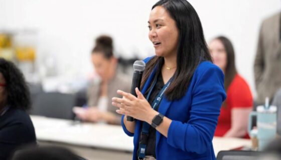 Janine Santiago speaks at an event