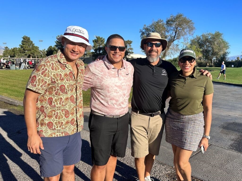 four golfers at a course in Las Vegas