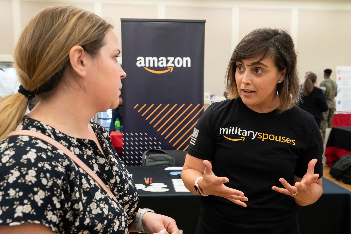 Amazon rep talking with job seeker