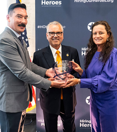 Hiring Our Heroes presents the Congressional Impact Award to Representative Mark Alford of Missouri with the 2024 Quality of Life Panel of the House Armed Services Committee at the Amplify Military Spouse Professional Development + Networking Reception. May 20, 2025