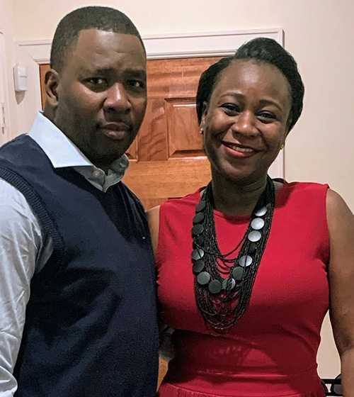 Military spouse Ami smiling with her husband