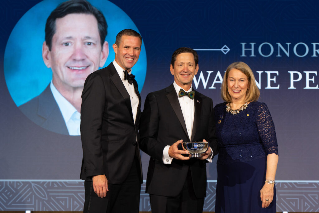 President's Award for Lifetime Achievement recipient, Wayne Peacock, poses with Eric Eversole, President of Hiring Our Heroes, and Bonnie Carroll, Founder of Tragedy Assistance Program for Survivors.