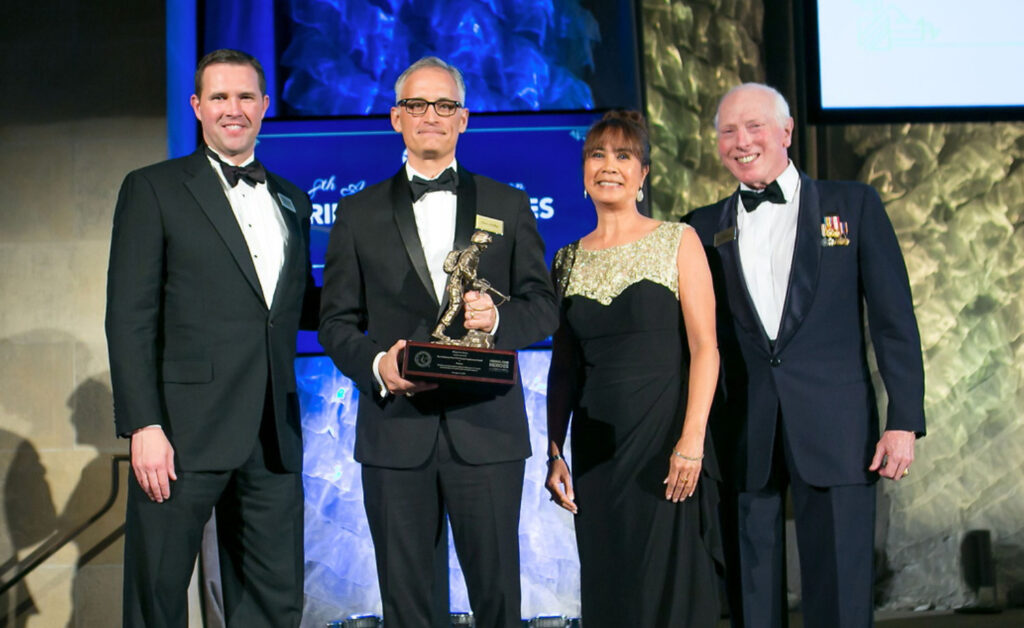 Sean Kelley accepts the 2018 Colonel Michael Endres Leadership Award at the Hiring Our Heroes Awards Gala.