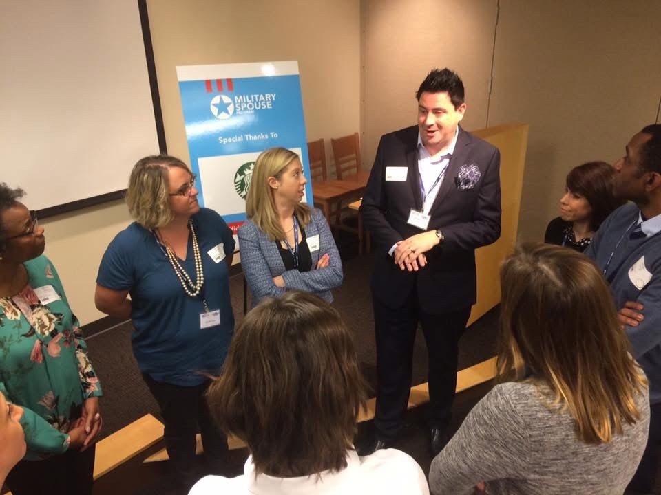 Brian Alvarado, Director of Events and Engagement for the Military Spouse Program at HOH, speaks with Amplify attendees during the first Amplify event in 2016 at Starbucks in Seattle