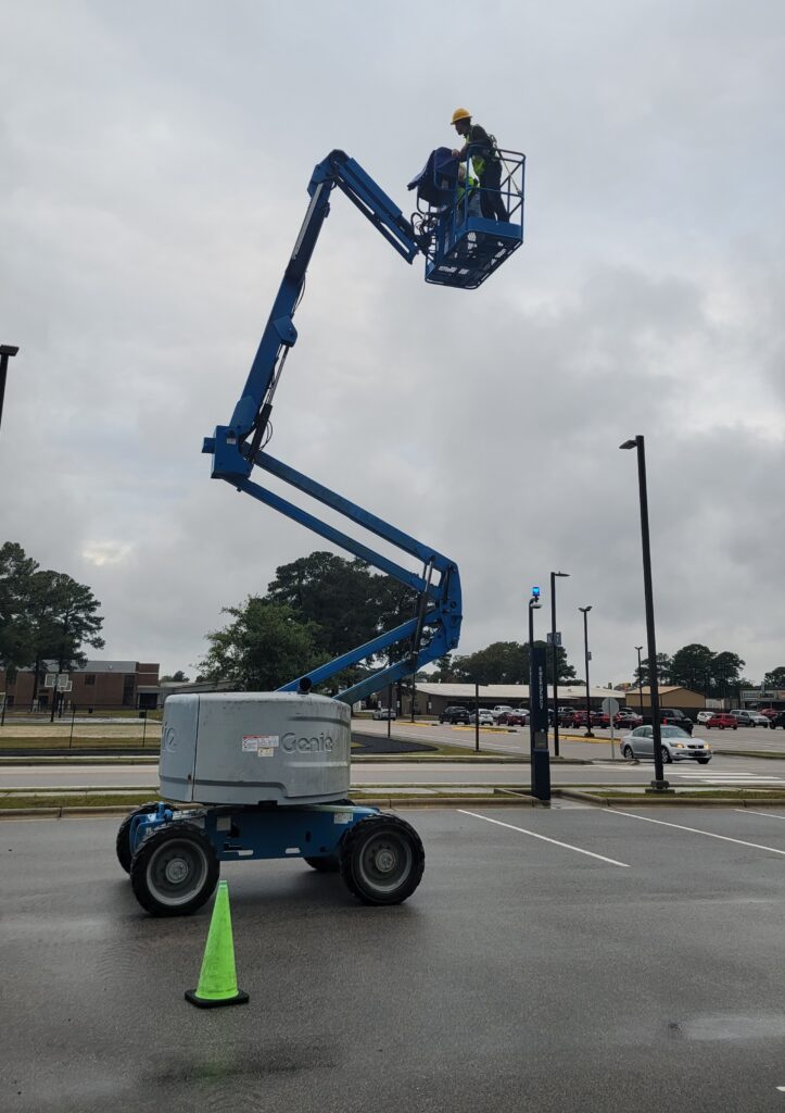 Cohort member practicing using a lift.