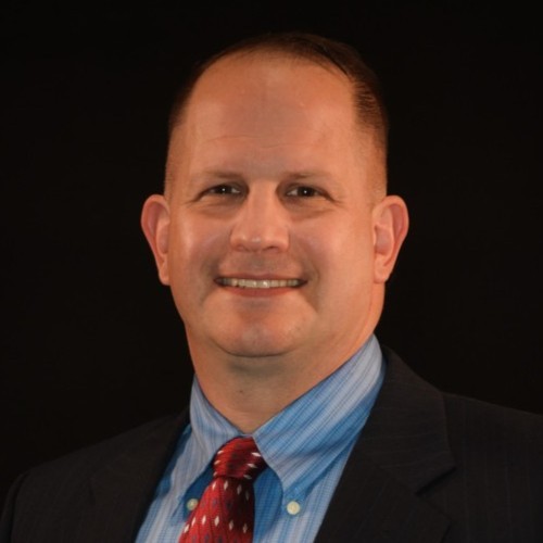 Marc Gaguzis' professional headshot.