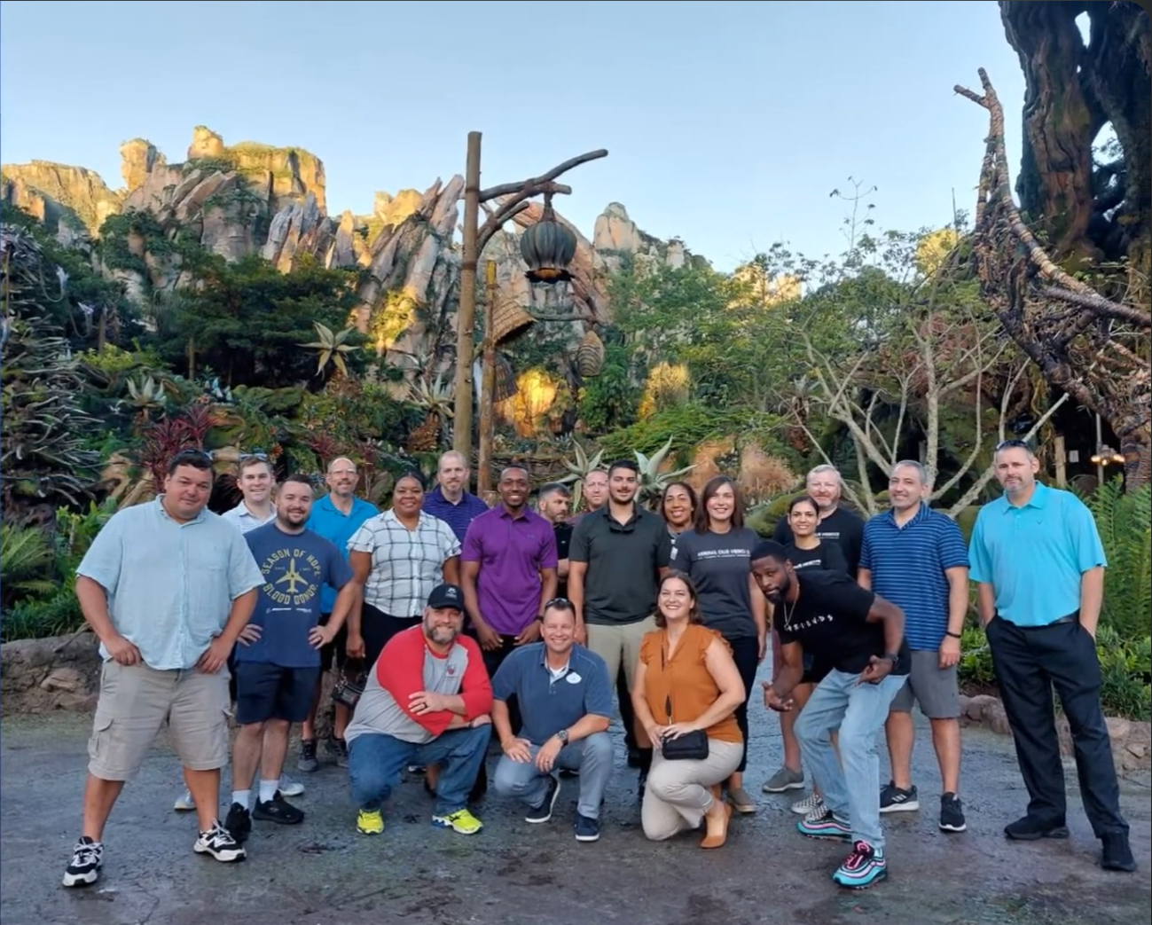 A group of fellows from 2022 pose for a photo at Disneyworld.
