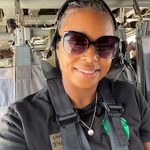 Tamara strapped into a helicopter during spouse flights